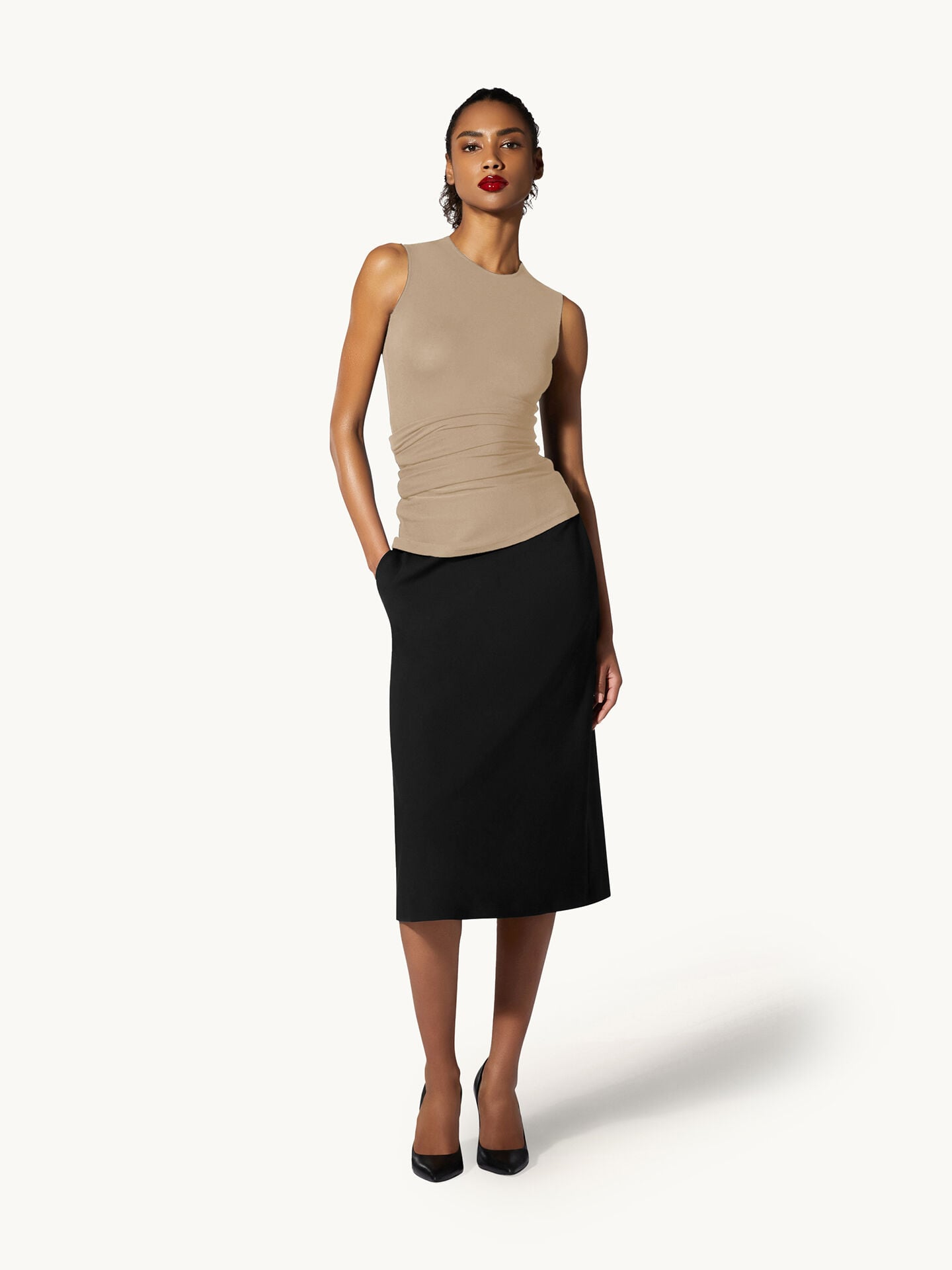THE CREPE JERSEY TOP SLEEVELES THE CREPE JERSEY TOP SLEEVELES